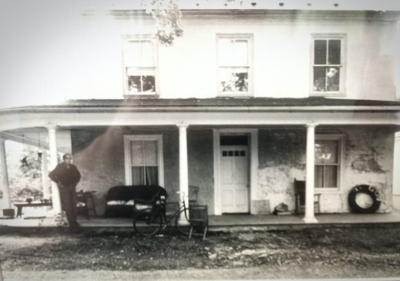 Jerry Stern in front of his canal house in Raubsville