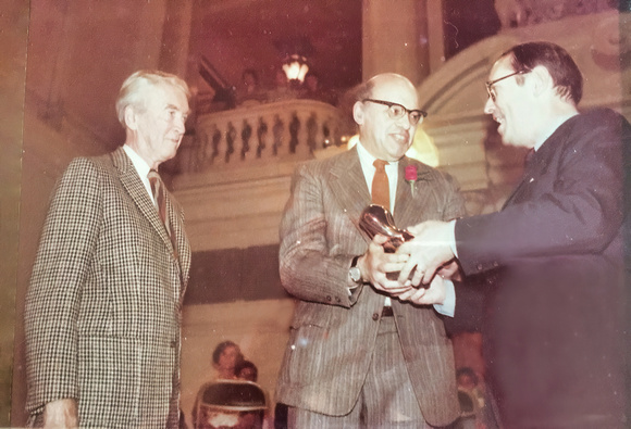Jerry accepting award from PA governor in State Capitol Jimmy Steward behind him