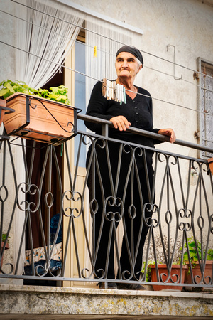 Albidona Woman on Balcony